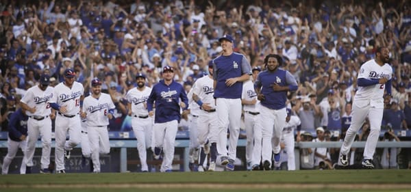 Dodgers Celebrate After Winning Wild Card Game